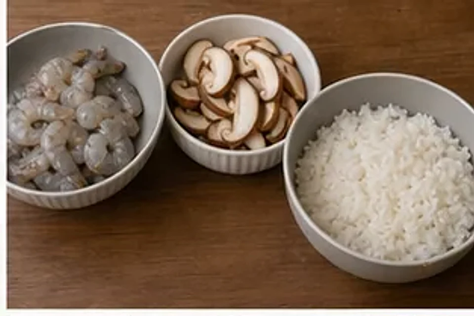 小锅鲜虾菌菇粥 第1步操作图