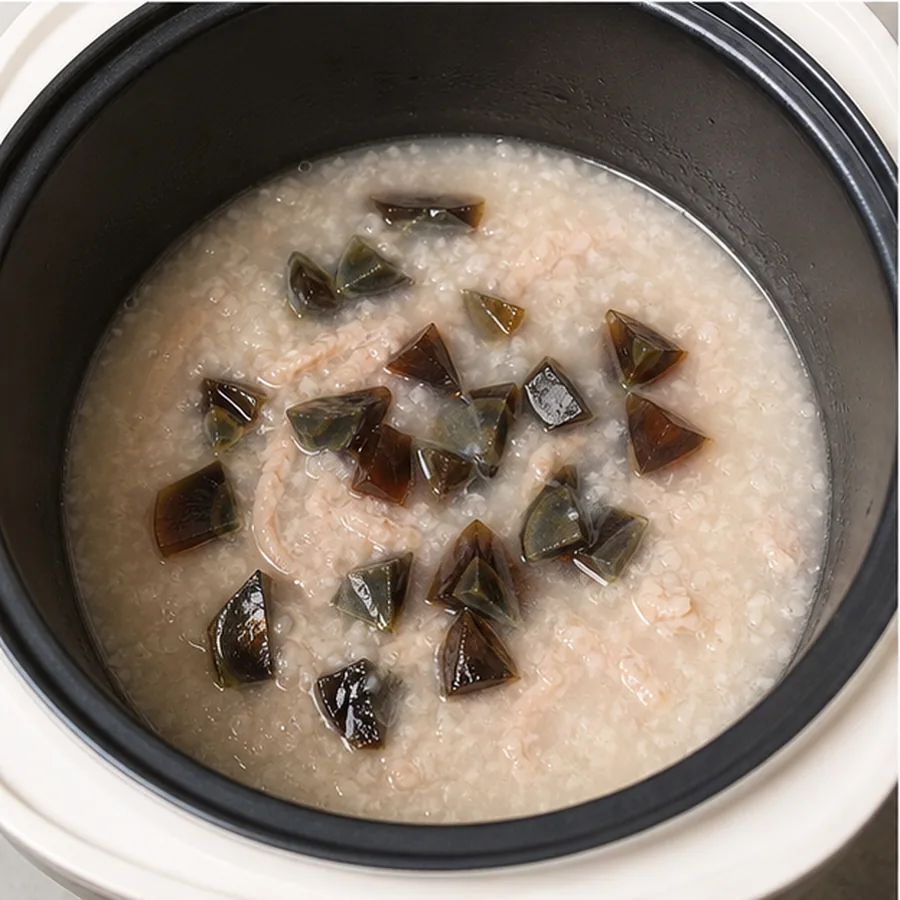 电饭煲皮蛋瘦肉粥 第2步操作图
